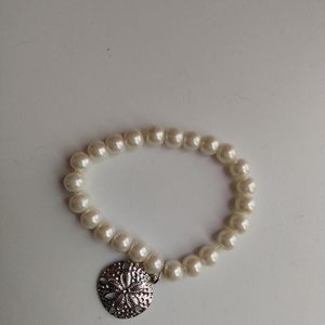 Pearl and starfish charm bracelet